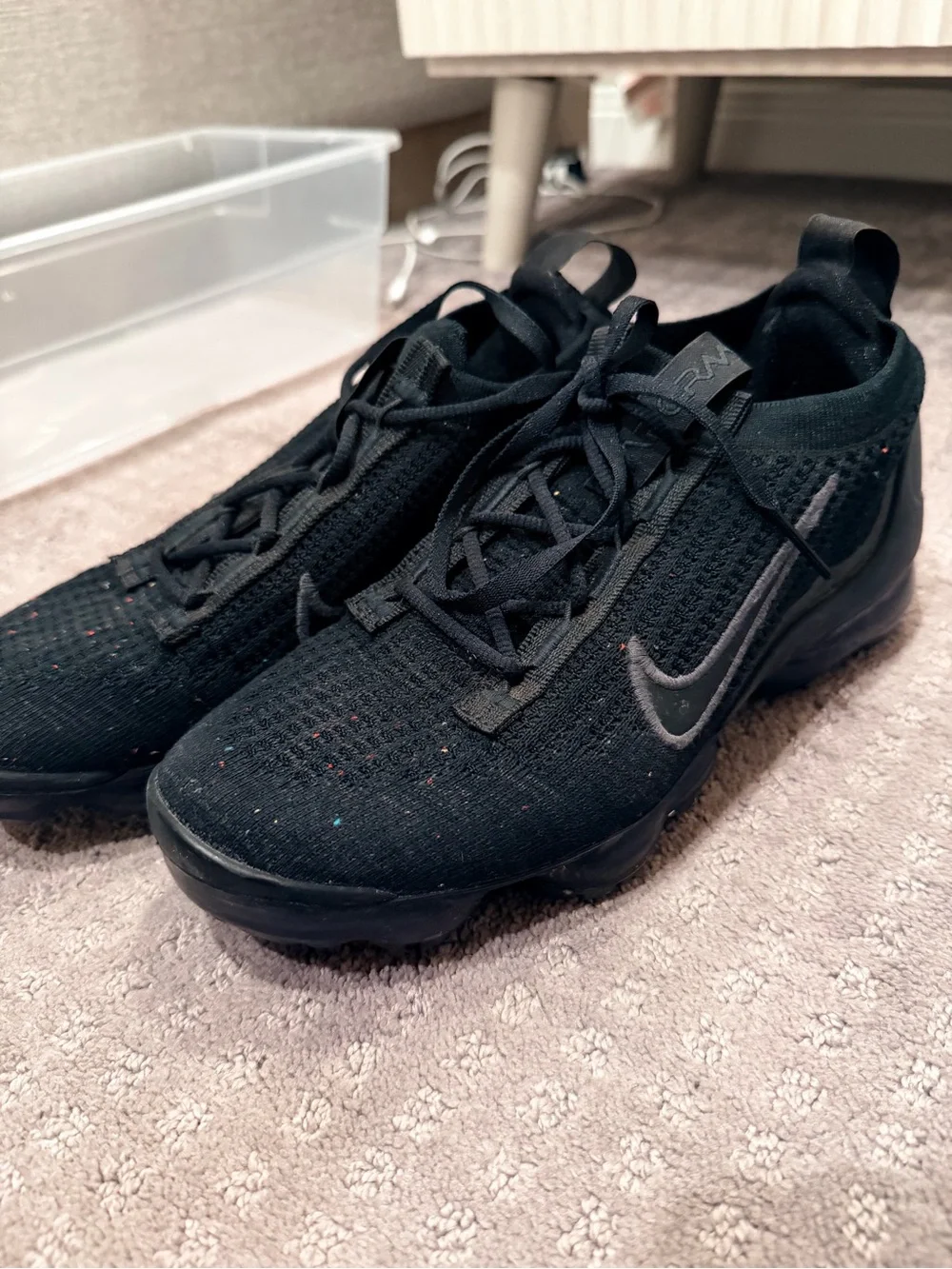 Nike Kids Black Flyknit-Style Sneaker with Subtle Gray Swoosh